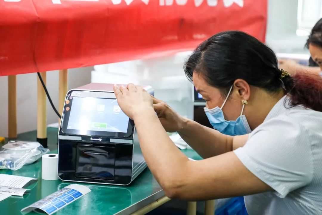 This worker is checking the equipment